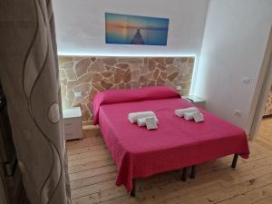 Postel nebo postele na pokoji v ubytování B & B Da Rosa