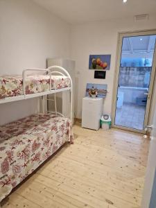 Postel nebo postele na pokoji v ubytování B & B Da Rosa