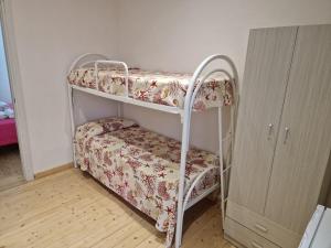 Postel nebo postele na pokoji v ubytování B & B Da Rosa