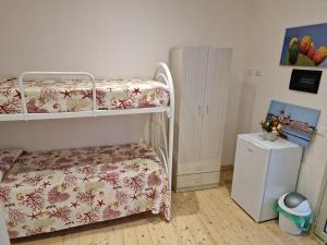 Postel nebo postele na pokoji v ubytování B & B Da Rosa