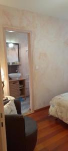 Area soggiorno di Appartements & Chambres Les Loges du Capucin