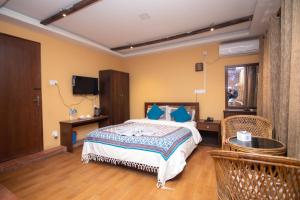 Letto o letti in una camera di Hong Si Hotel- A Home Away from Home
