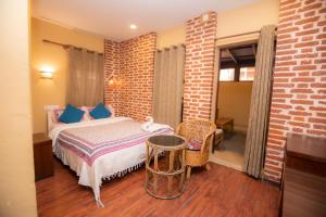 Letto o letti in una camera di Hong Si Hotel- A Home Away from Home