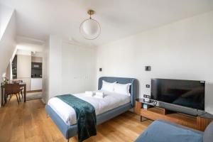 Ένα ή περισσότερα κρεβάτια σε δωμάτιο στο Luxurious flat in the center