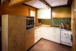 A cozinha ou kitchenette de Ferienhaus Wisli