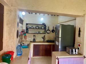 Kuchyň nebo kuchyňský kout v ubytování Sai Shanti House + 2 fotografie
