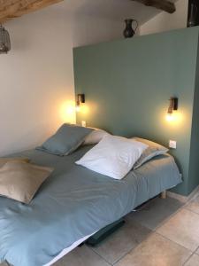 Postel nebo postele na pokoji v ubytování Gîte La Liaucoussette