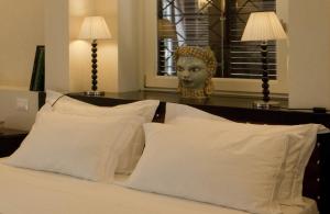 Villa Athena Resort客房内的一张或多张床位