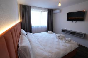 Biond Hotel客房内的一张或多张床位