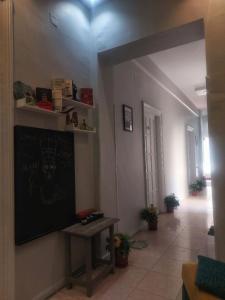 TV a/nebo společenská místnost v ubytování Minerva Grand Hostel Cairo