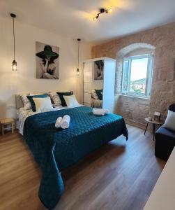 Postel nebo postele na pokoji v ubytování Studio Apartment Maria