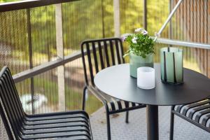 Un balcón o terraza en Unity Malmö - A Studio Hotel