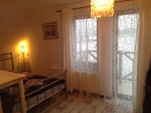Łóżko lub łóżka w pokoju w obiekcie Gospodarstwo Rospuda