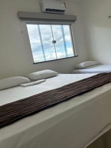 Postel nebo postele na pokoji v ubytování Mais Hotel Express