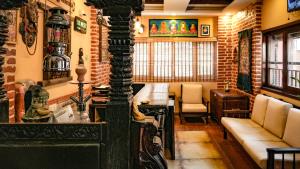 Area soggiorno di Hong Si Hotel- A Home Away from Home