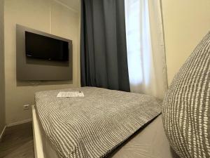 Ein Bett oder Betten in einem Zimmer der Unterkunft Simplex Stays Hotel Quartier 8