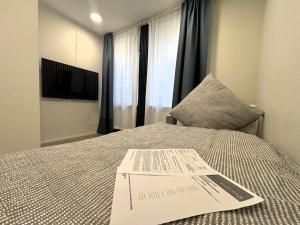 Ein Bett oder Betten in einem Zimmer der Unterkunft Simplex Stays Hotel Quartier 8