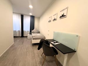 TV/Unterhaltungsangebot in der Unterkunft Simplex Stays Hotel Quartier 8