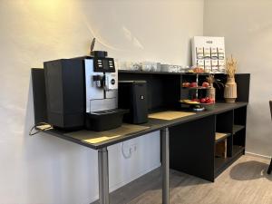 Küche/Küchenzeile in der Unterkunft Simplex Stays Hotel Quartier 8