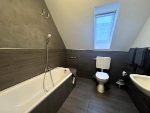 Ein Badezimmer in der Unterkunft Simplex Stays Hotel Quartier 8