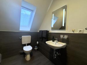 Ein Badezimmer in der Unterkunft Simplex Stays Hotel Quartier 8