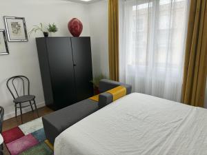 Voodi või voodid majutusasutuse Domus26 Chambre ORIENTEM toas