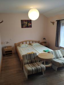 Postel nebo postele na pokoji v ubytování Smaidas apartamenti
