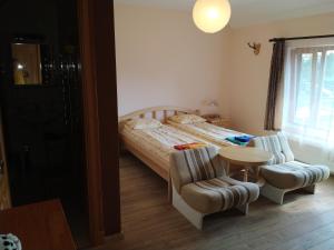Postel nebo postele na pokoji v ubytování Smaidas apartamenti