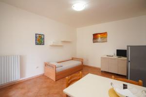 A television and/or entertainment centre at Casa Vacanza Russo Fernando