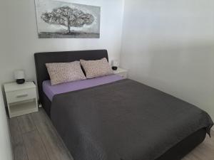 Ένα ή περισσότερα κρεβάτια σε δωμάτιο στο Bruno