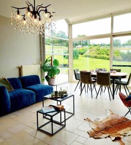 Posezení v ubytování Cha Cha de Loup Luxe B&B - Vakantiewoning