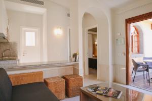 A seating area at Maspalomas Resort by Dunas