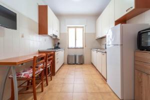 Kuchyň nebo kuchyňský kout v ubytování Alghero Retreat + 14 fotografií