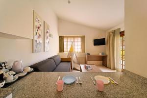 A television and/or entertainment centre at Maspalomas Resort by Dunas