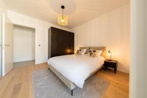Postel nebo postele na pokoji v ubytování Halternative Residence Renaissance