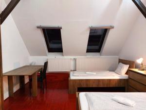 Posteľ alebo postele v izbe v ubytovaní Black Sheep Budapest Smart Rooms