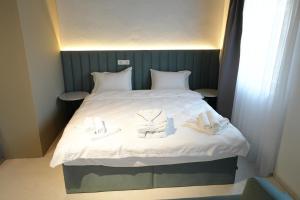 Biond Hotel客房内的一张或多张床位