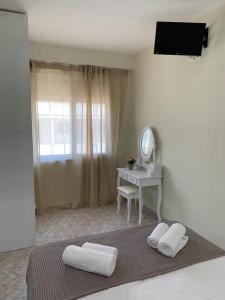 Postel nebo postele na pokoji v ubytování Apartment near Piraeus port