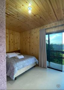 Postel nebo postele na pokoji v ubytování Hotel e Pousada Cabanas Arbor