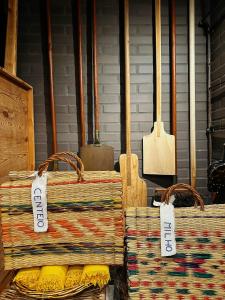 two wicker baskets sitting on top of each other at Moinho do Duque in Runa
