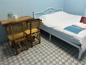 Postel nebo postele na pokoji v ubytování Noot's Guesthouse