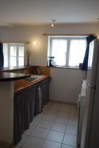 Kuchyň nebo kuchyňský kout v ubytování Le Logis de Loulou + 10 fotografií