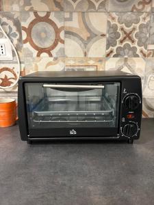 Una cocina o kitchenette en Lovely apartment in the center of Rome, Monti 16 fotos más