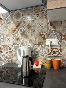 Una cocina o kitchenette en Lovely apartment in the center of Rome, Monti