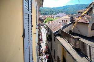 a view of a city street from a building at Torre di Londra in Stresa
