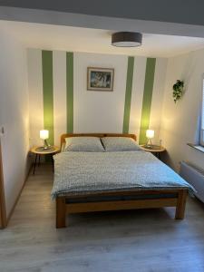 Postel nebo postele na pokoji v ubytování Resi's Gästehaus