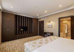 Voodi või voodid majutusasutuse National by Stellar Hotels, Yerevan toas