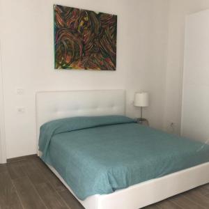 Postel nebo postele na pokoji v ubytování New Corso Italia Savona + 3 fotografie