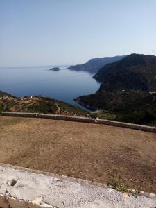 a view of a large body of water on a hill at Aelia Studio Alonissos in Alonnisos +26 photos