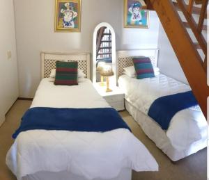 Ένα ή περισσότερα κρεβάτια σε δωμάτιο στο Blue Water Bay Holiday Apartment +59 φωτογραφίες